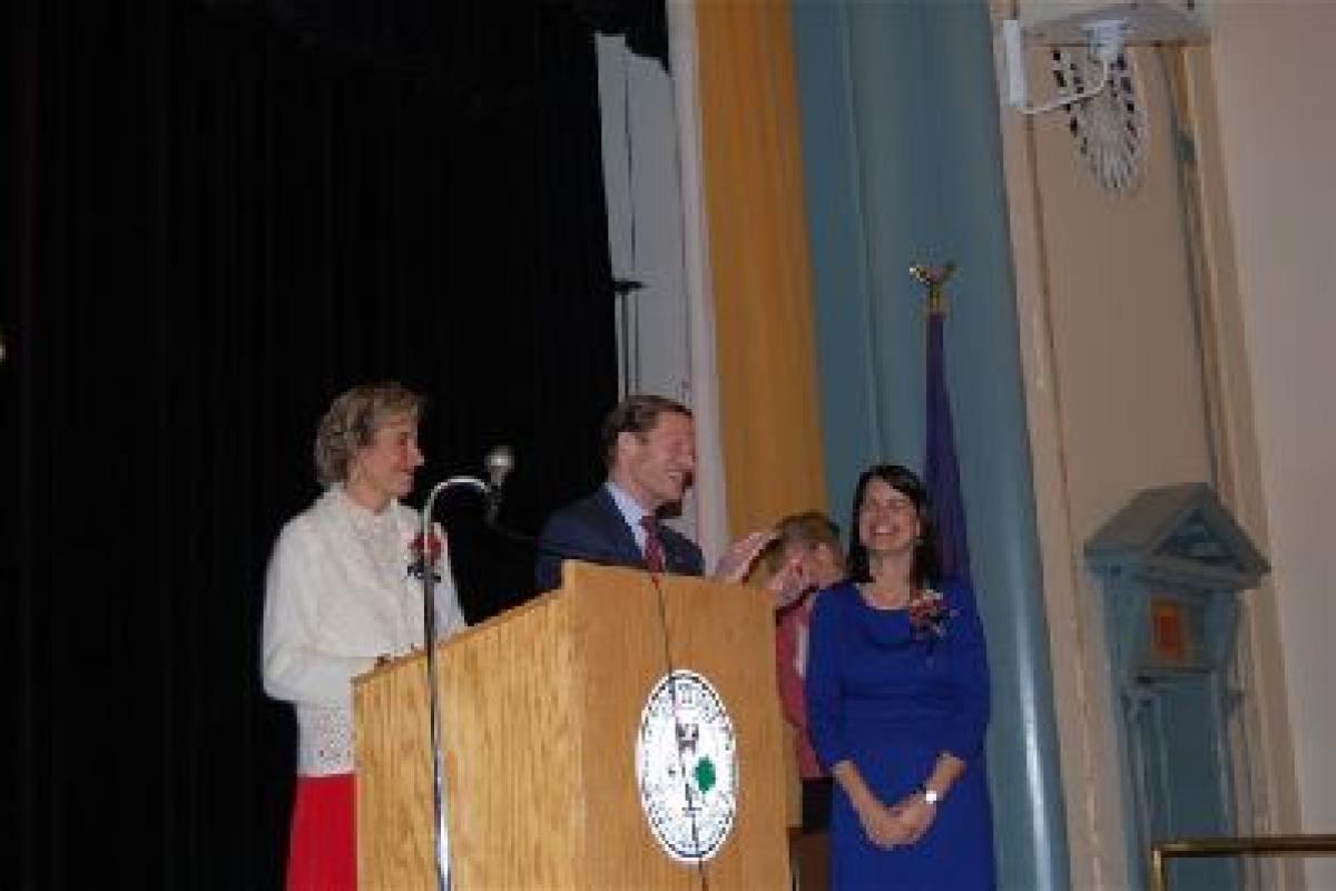 Atty. General Blumenthal, State Rep. Linda Schofield applaud First Selectman Glassman.